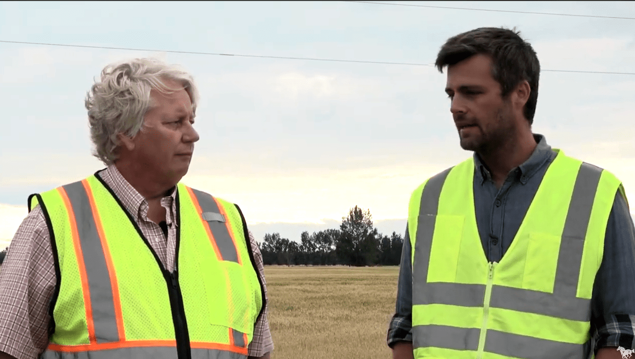 David West of Team Lab Chemical Co. with Base One® talks with Erik Hove, County Engineer from Red Lake County, MN.
